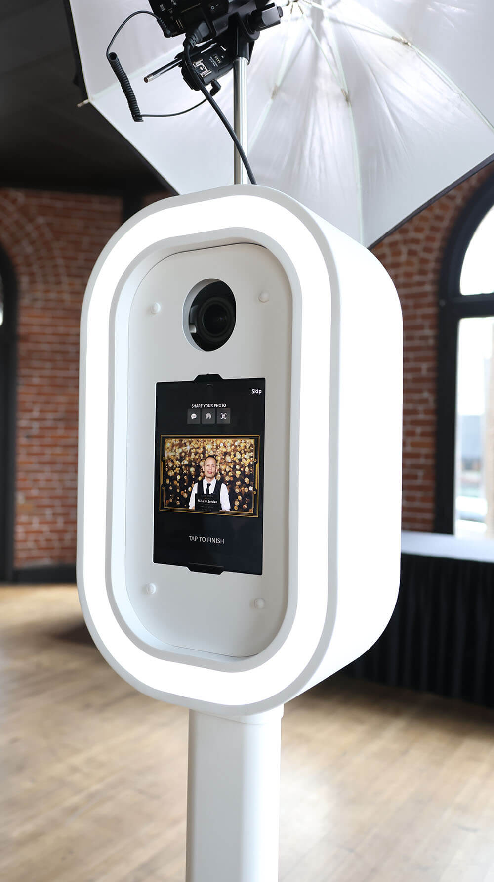 close up on an ipad inside a white photobooth shell
